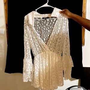 This is a white see through cover up.